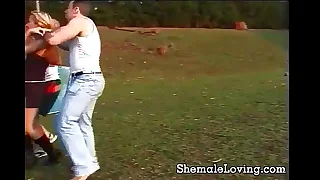 Slutty shemale playing with 2 cocks